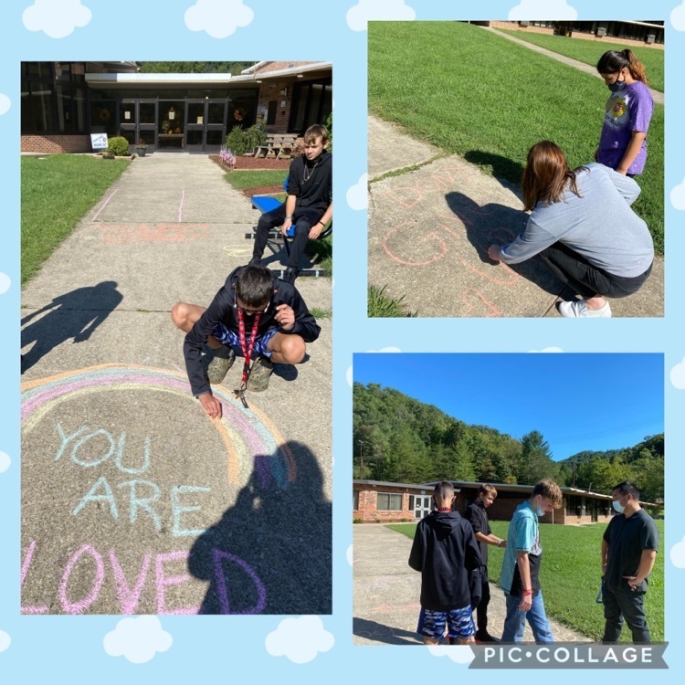 students using sidewalk chalk