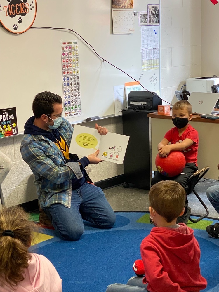 teacher reading a book