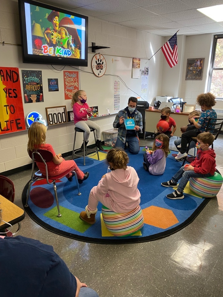 teacher reading to students